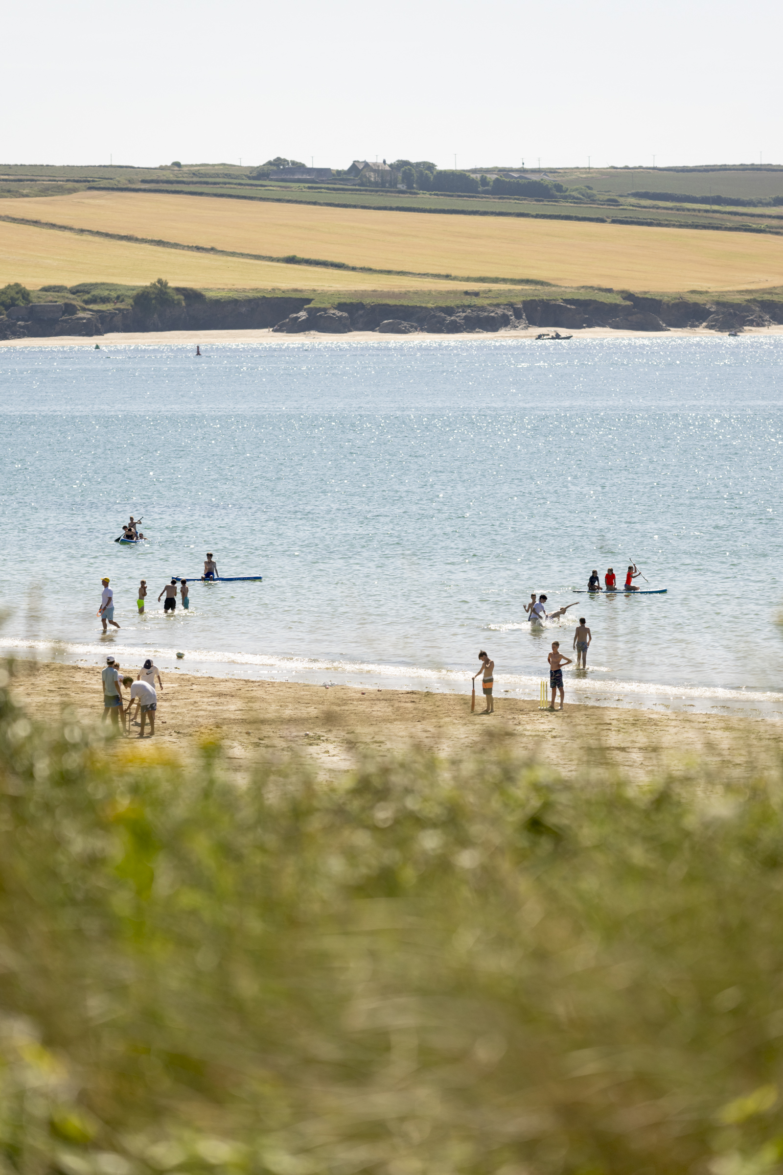 Families enjoying the beach at Daymer Bay